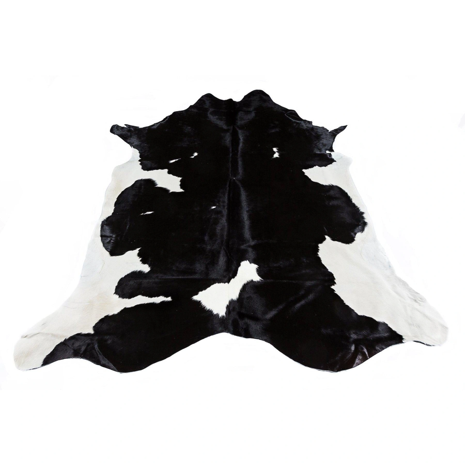 Friesian Black Cowhide Rug: Bold Black & White Beauty - Luxurious & Unique!